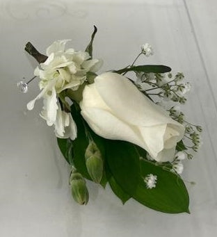 Prom Flowers. Graduation day is here! Flowers for the prim, buttonier, bracelet, order online for the graduation ceremony. Home delivery Miami