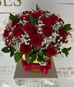 Roses And Gypsophila arrangement in a luxurious gold gift box, perfect for any occasion, from birthdays to anniversaries, this gift is sure to please, home delivery roses in Miami, Doral Roses Miami