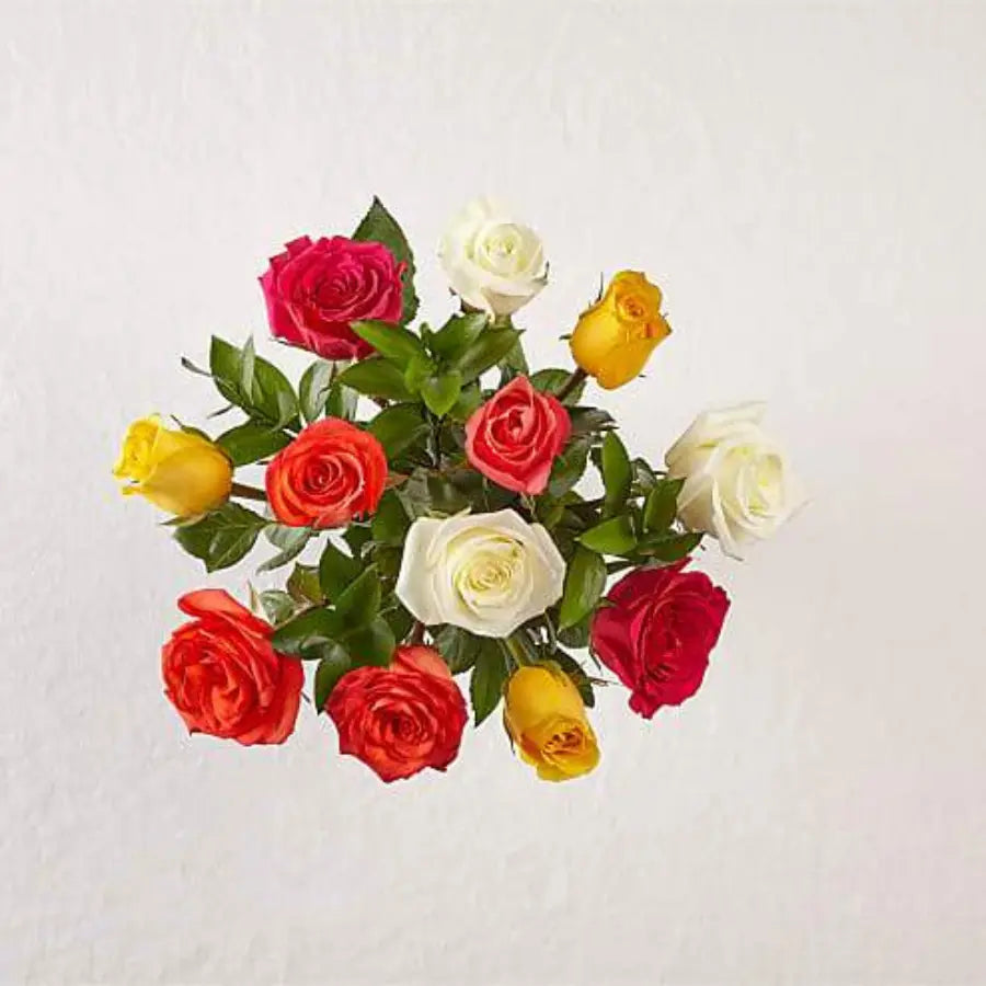 12 Mixed Roses With Vase Colorful and blooming, this vibrant bouquet of a dozen roses in beautiful colors. 12 Rosas Mixtas Con Jarrón Colorido y floreciente, este vibrante ramo de una docena de rosas en hermosos colores. Doral Roses Miami b