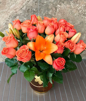 Salmon roses and lilies