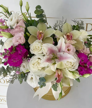 Fabiana Floral Design, Flowers Charm Golden BoxSpecial box with roses, mini roses, orchids, and mixed flowers ideal for decorating, we deliver your Doral Roses Miami flowers to your home.